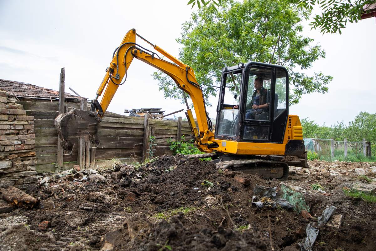 excavator with Bucket lift up are digging the soil in the construction site on